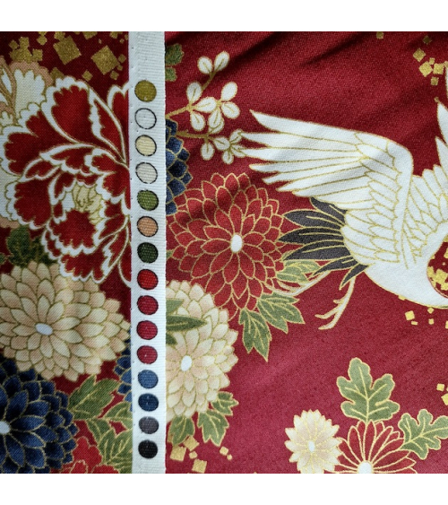 Japanese fabric. Flying Cranes and flowers in red.