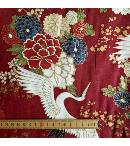 Japanese fabric. Flying Cranes and flowers in red.