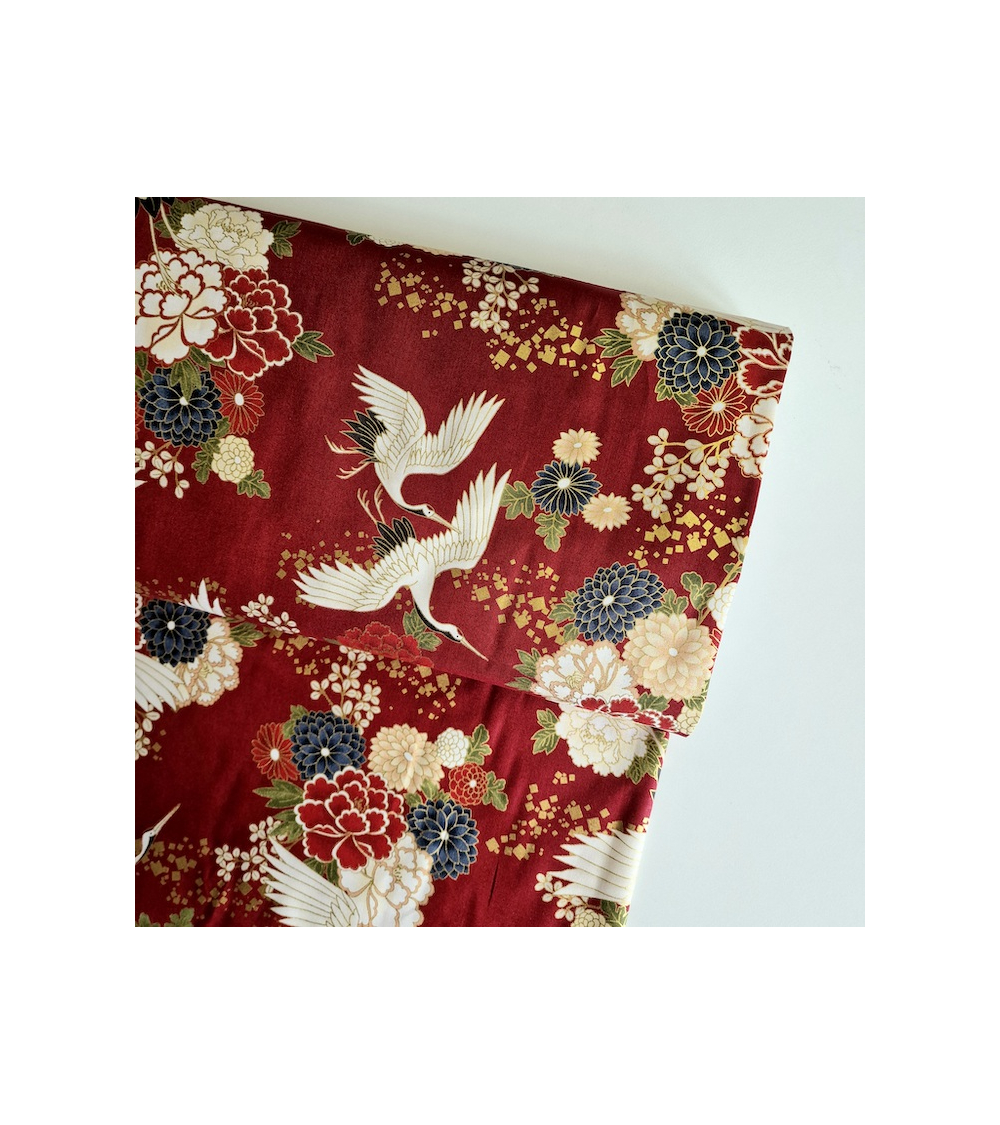 Japanese fabric. Flying Cranes and flowers in red.