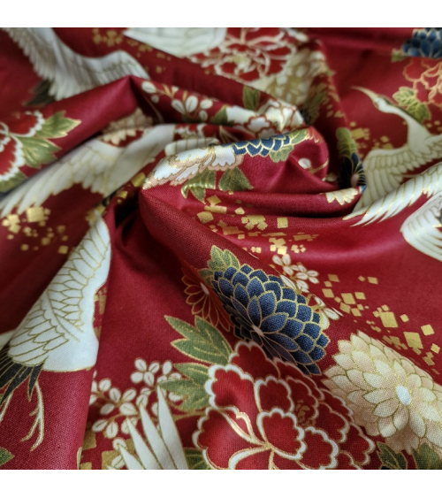 Japanese fabric. Flying Cranes and flowers in red.