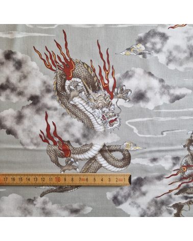 Japanese cotton fabric of dragons and clouds on grey.