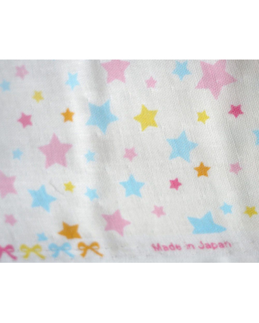 Tela japonesa. Estrellas de colores sobre fondo blanco