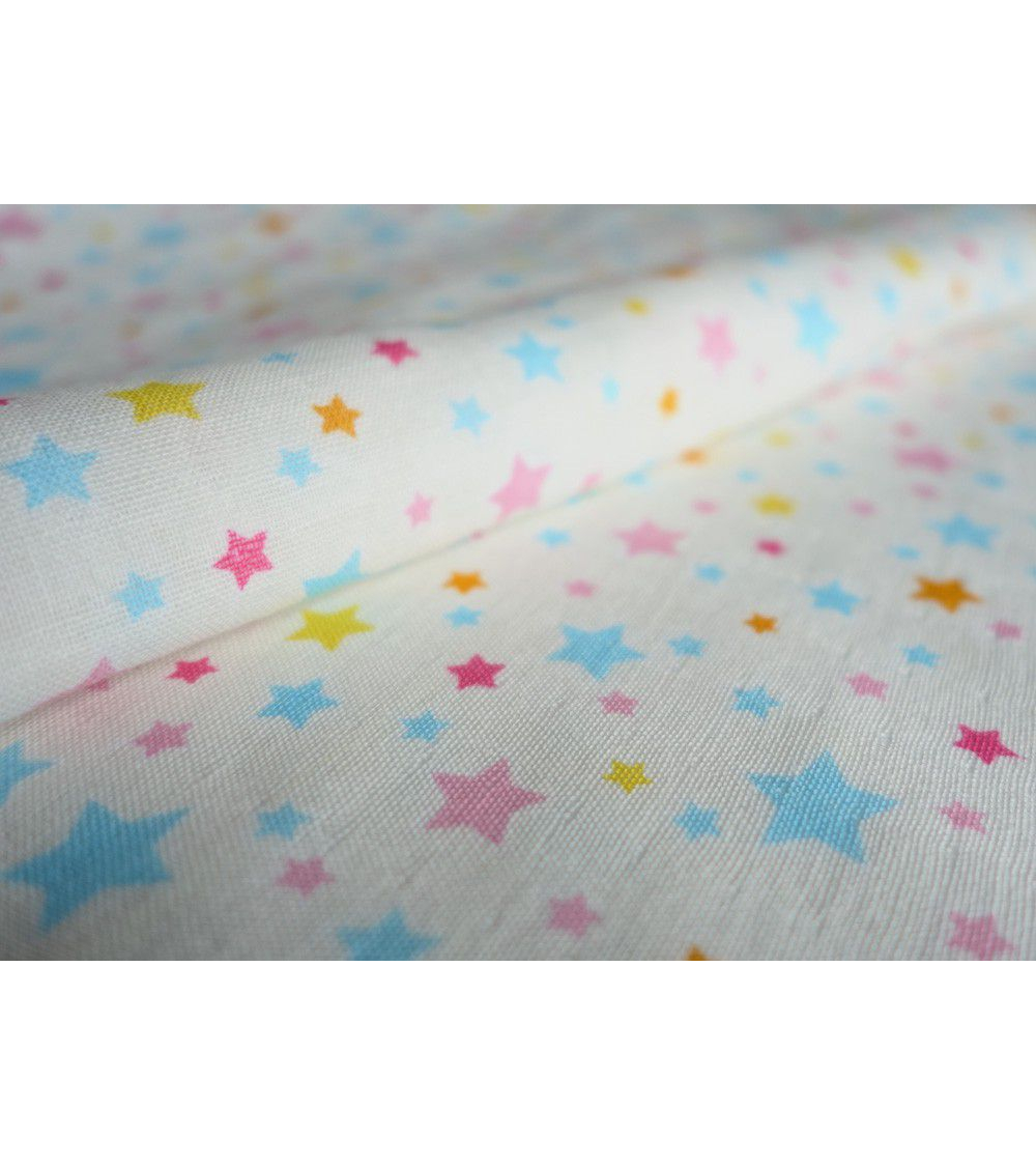 Tela japonesa. Estrellas de colores sobre fondo blanco