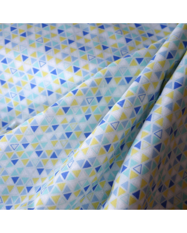 Tela japonesa. Doble gasa triángulos amarillo y tonos azul