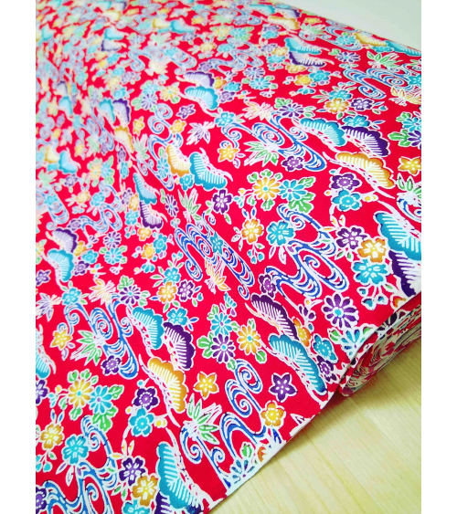 Japanese fabric. Bingata floral print over red.