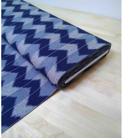 Zigzag pattern over an indigo blue