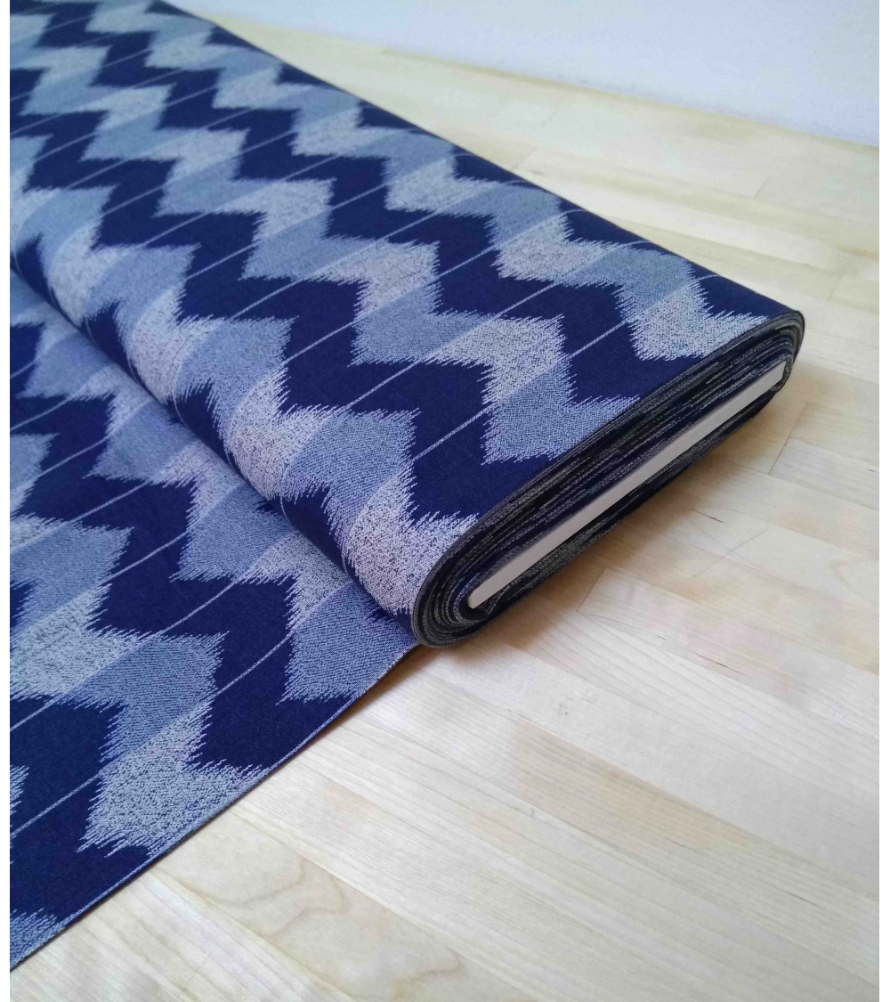 Zigzag pattern over an indigo blue