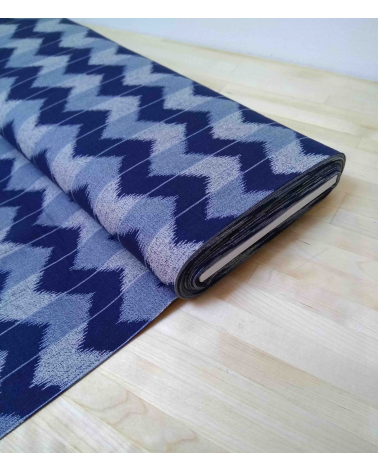 Zigzag pattern over an indigo blue