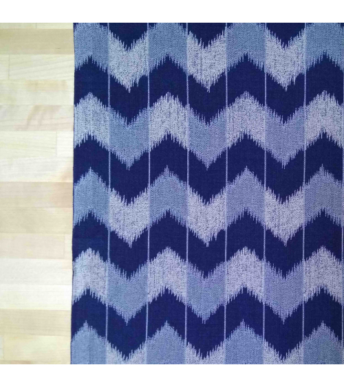 Zigzag pattern over an indigo blue