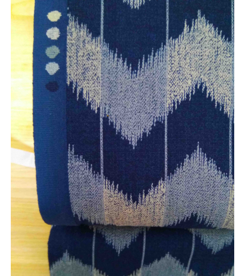 Zigzag pattern over an indigo blue
