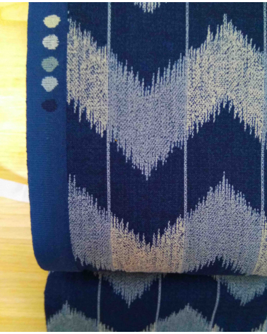 Zigzag pattern over an indigo blue