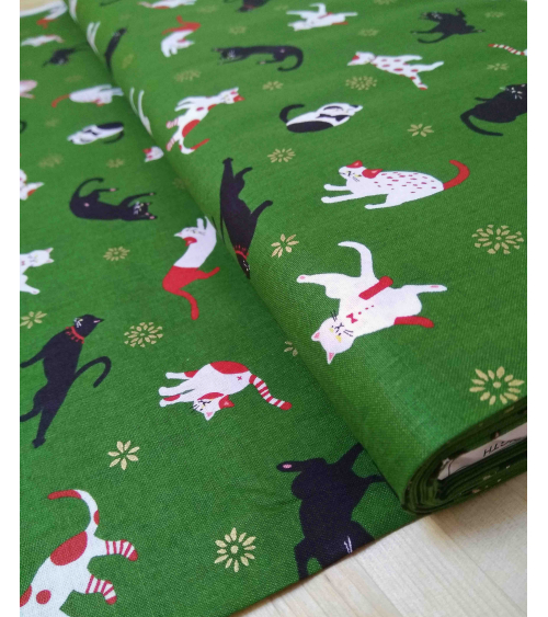 Japanese fabric. Cats over forest green.
