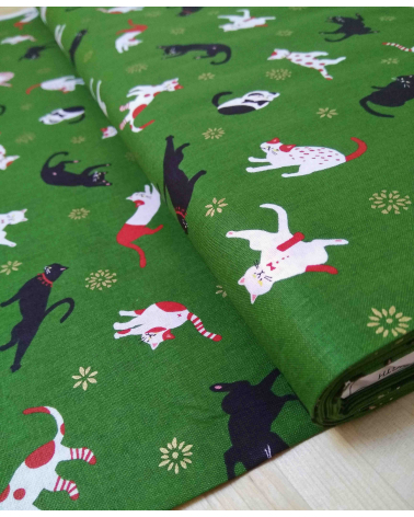 Japanese fabric. Cats over forest green.