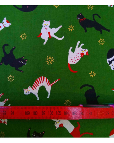 Japanese fabric. Cats over forest green.