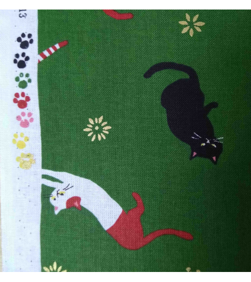 Japanese fabric. Cats over forest green.
