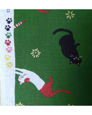 Japanese fabric. Cats over forest green.