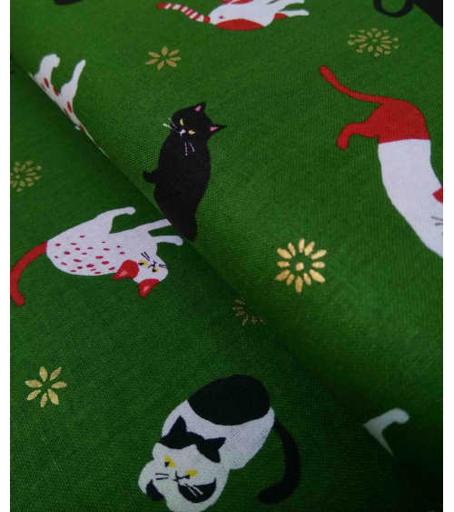 Japanese fabric. Cats over forest green.