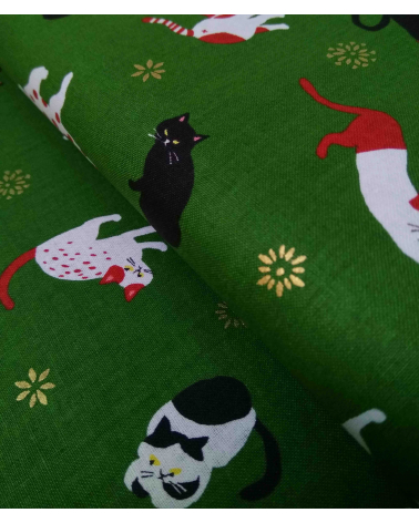 Japanese fabric. Cats over forest green.