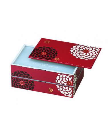 Bento box (lunch box) flores blancas y negras sobre fondo rojo