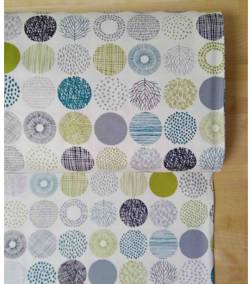 Light oxford Japanese fabric. Graphic circle pattern.