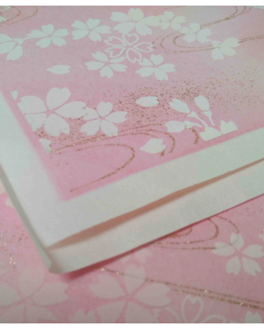 Papel chiyogami sakuras blancas en relieve sobre fondo rosa
