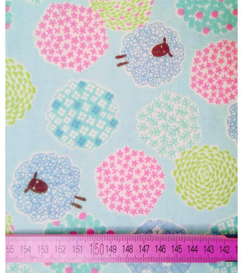 Little sheeps over blue. Japanese double gauze