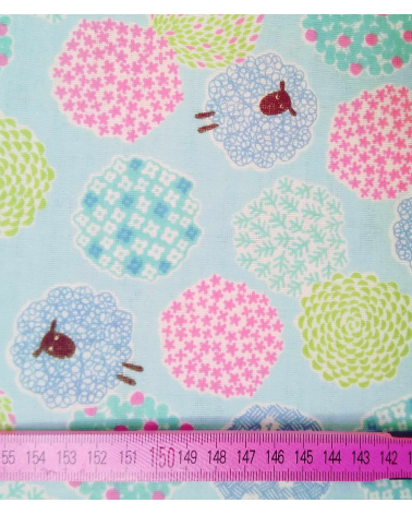 Little sheeps over blue. Japanese double gauze