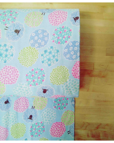 Little sheeps over blue. Japanese double gauze