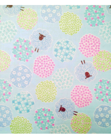 Little sheeps over blue. Japanese double gauze