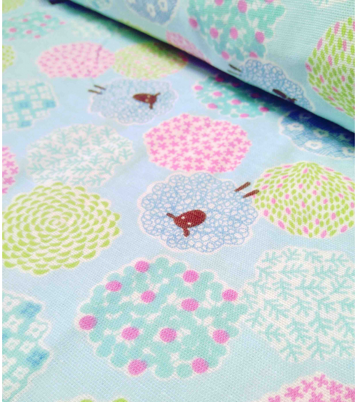 Little sheeps over blue. Japanese double gauze