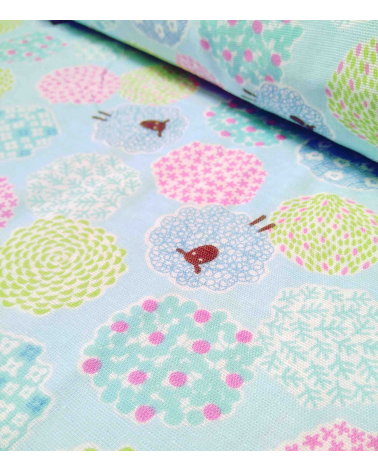 Little sheeps over blue. Japanese double gauze
