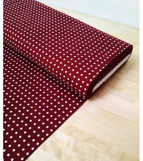 Japanese cotton fabric. Polka dots over maroon.