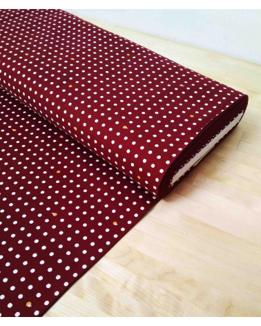 Japanese cotton fabric. Polka dots over maroon.