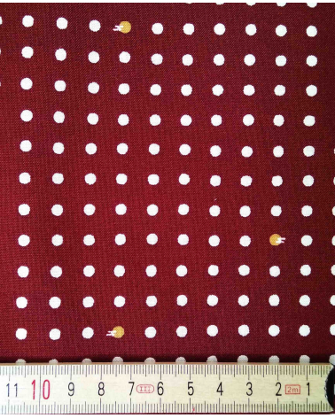 Tela japonesa de algodón. Lunares sobre castaño rojizo.