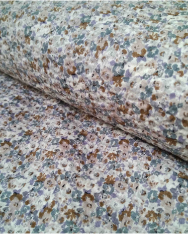 Embossed cotton fabric. Little flowers in muted colors.