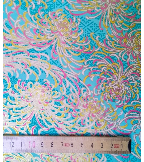 Papel chiyogami Kiku azul turquesa.