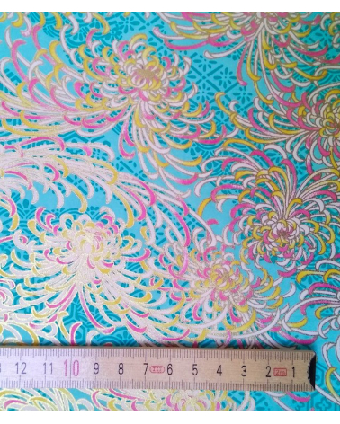 Papel chiyogami Kiku azul turquesa.