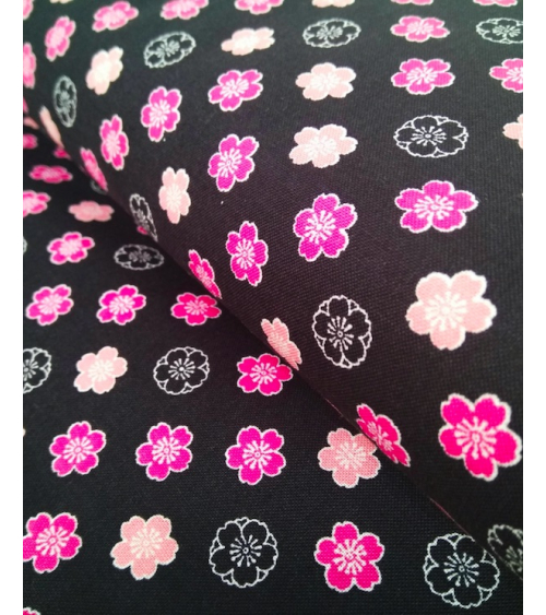 Japanese cotton fabric. Sakura flowers over black