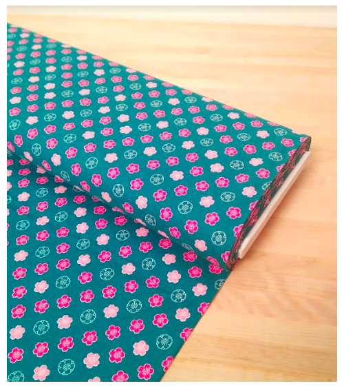 Japanese cotton fabric. Sakura flowers over blue