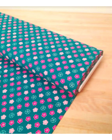 Japanese cotton fabric. Sakura flowers over blue