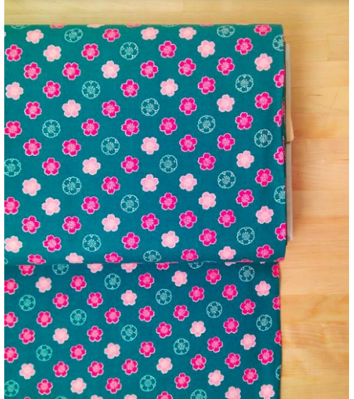 Japanese cotton fabric. Sakura flowers over blue