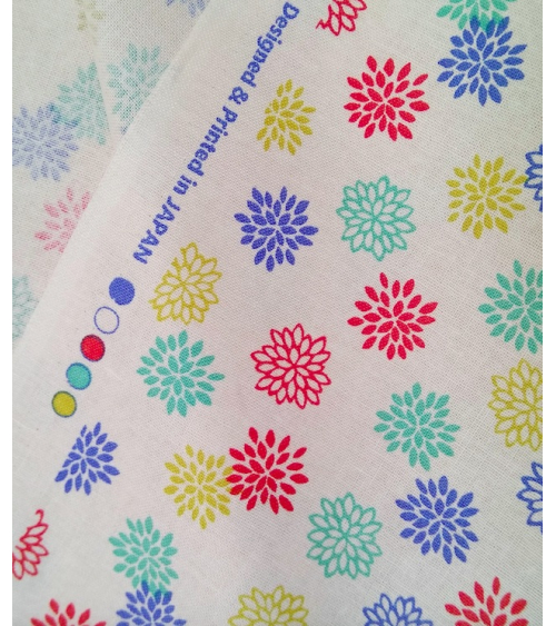 Japanese cotton fabric. Colorful Dahlias over beige.