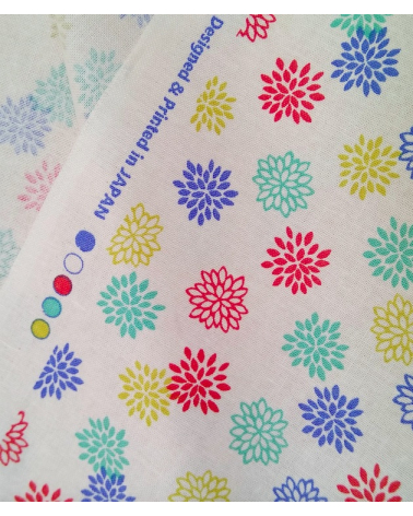 Japanese cotton fabric. Colorful Dahlias over beige.