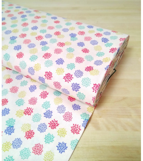 Japanese cotton fabric. Colorful Dahlias over beige.