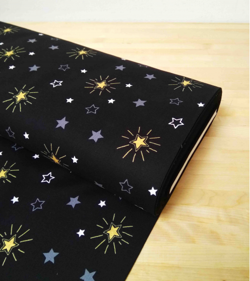 Tela japonesa. Estrellas sobre fondo negro