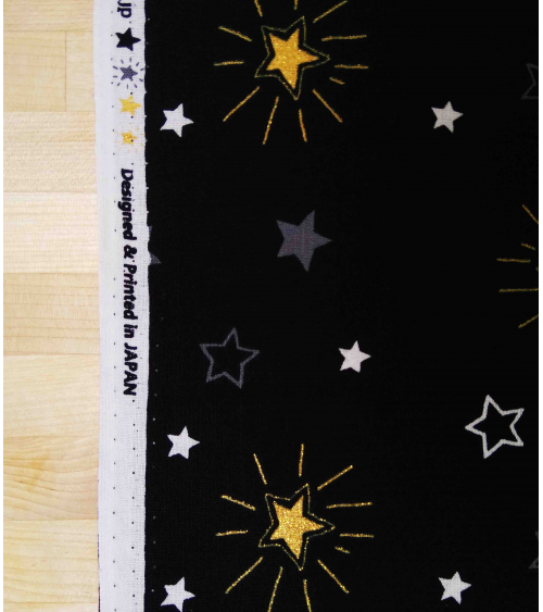 Tela japonesa. Estrellas sobre fondo negro