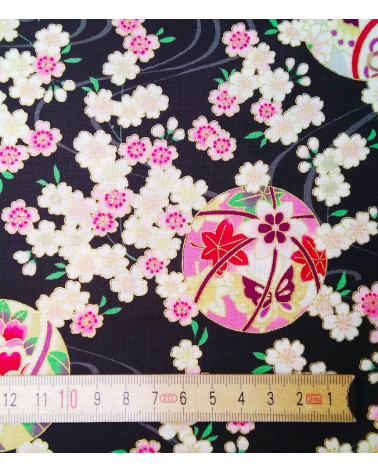 Japanese fabric. Sakura and temari over black.