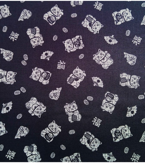 Japanese cotton fabric. Maneki Neko over indigo blue