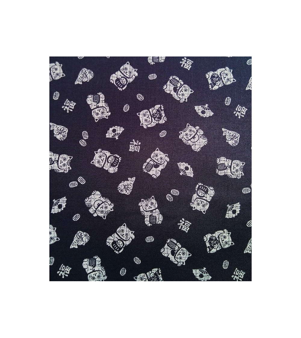 Tela japonesa. Maneki neko sobre azul índigo