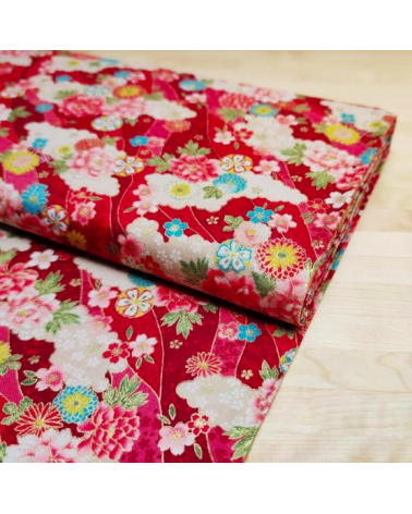 Japanese fabric. Flowers and clouds over red.